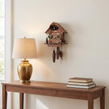 Hermle Chalet Quartz Cuckoo Clock, 413QM - shown hanging on a wall