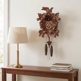 Hermle Three Bird Quartz Cuckoo Clock, 352QM - shown hanging on a wall